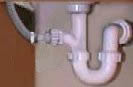 Drain hose goes up from spigot