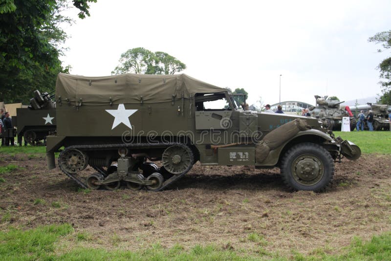 Normandy, France; 4 June 2014: Normandy, France; 4 June 2014: Vintage U.S. army WWII half-truck on display. Metal willys war transport camp armored old us off stock images