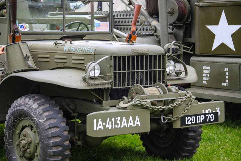 Normandy, France; 4 June 2014: Normandy, France; 4 June 2014: Vintage U.S. army WWII truck on display. Metal willys war transport camp armored old us off-road stock photography