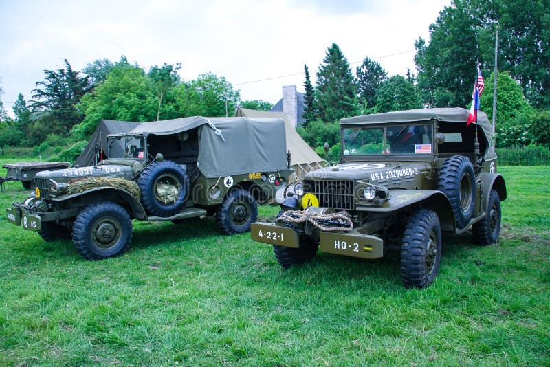 Normandy, France; 4 June 2014: Normandy, France; 4 June 2014: Vintage U.S. army WWII truck on display. Metal willys war transport camp armored old us off-road stock photos