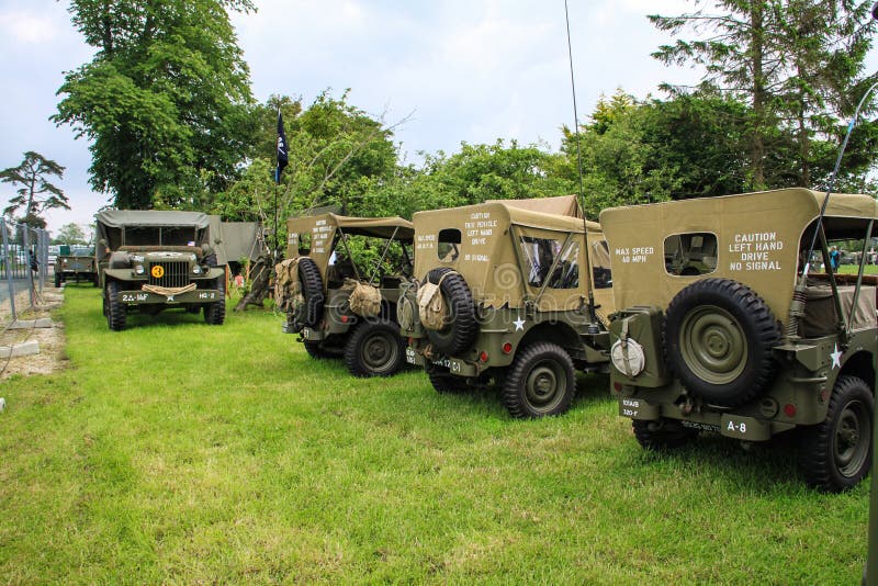 Normandy, France; 4 June 2014: Normandy, France; 4 June 2014: Vintage U.S. army WWII truck on display. Metal willys war transport camp armored old us off-road stock image