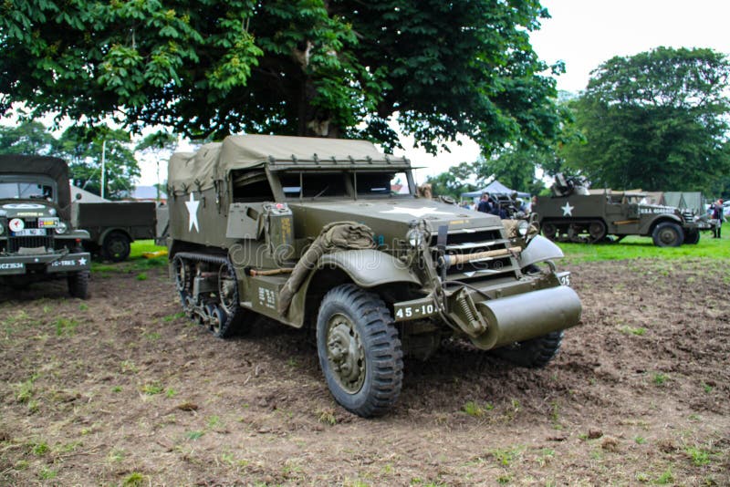 Normandy, France; 4 June 2014: Normandy, France; 4 June 2014: Vintage U.S. army WWII half-truck on display. Metal willys war transport camp armored old us off stock image